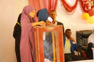Student casting her vote for the recently help students election